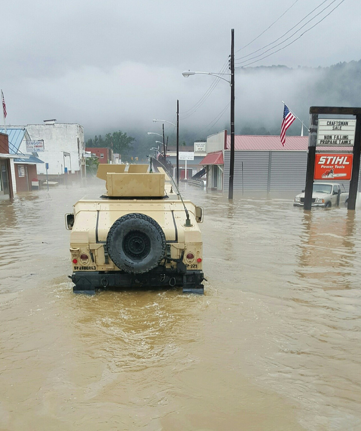 Members of the 811th Ordnance Company, 321st Ordnance Battalion, 38th Regional Support Group,
      perform rescue efforts in partnership with local and state emergency first responders in Rainelle, WV, on
      24 June 2016. (Credit: MAJ Sean Delpech)